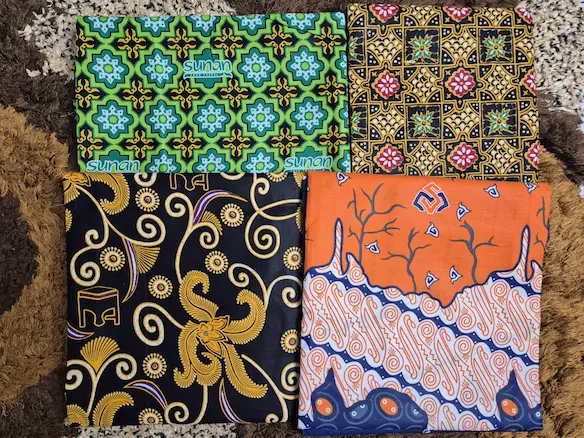 Real picture hasil produksi kain seragam batik umroh dan haji motif custom logo travel